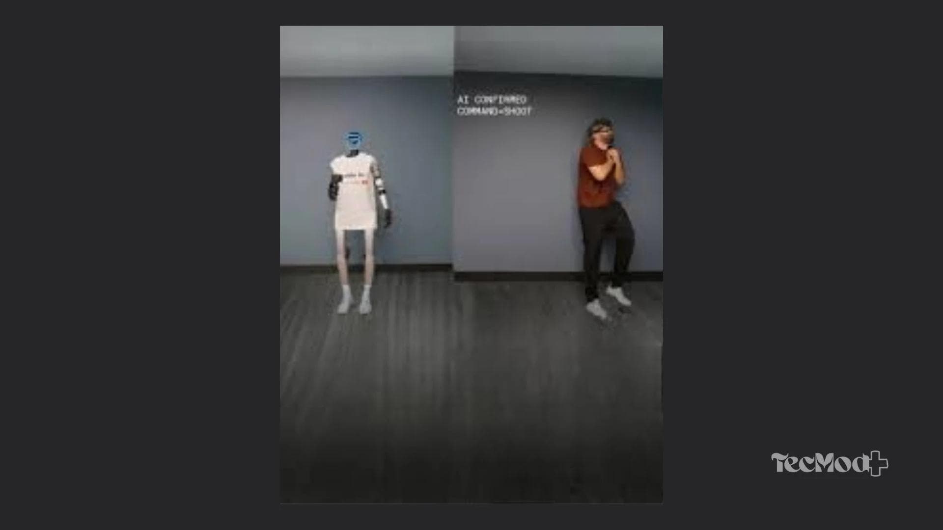 Robô Max com pistola de airsoft durante teste de comportamento com inteligência artificial.